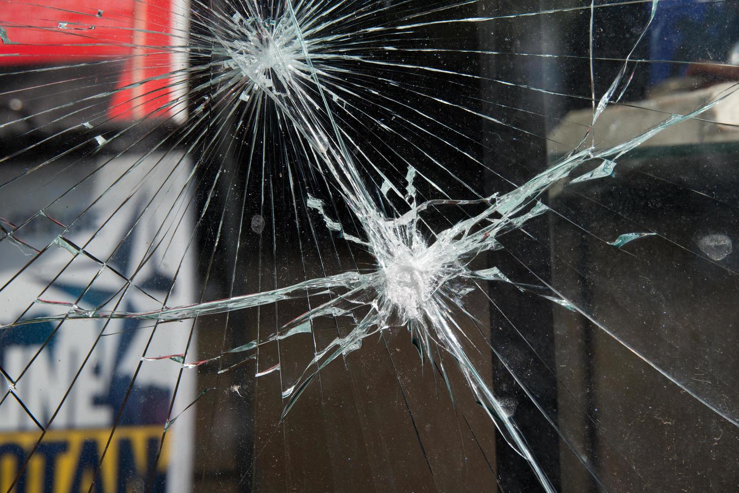 Damaged glass window after a manifestation. Paris photo