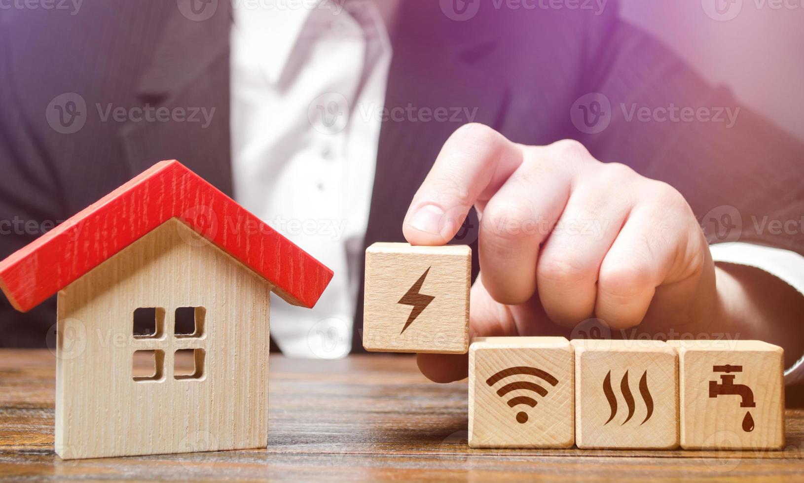 House with home service utilities blocks. Installation of communications and conclusion of contracts with supply companies. Electricity, water and gas. Internet services. Connecting to city network photo