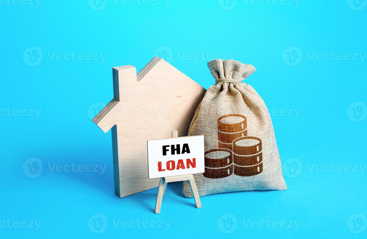 Silhouette of a house with a money bag and FHA loan easel. Mortgage insured by Federal Housing Administration Loan. Affordable financial instrument for borrowers with a low credit score. High risk photo