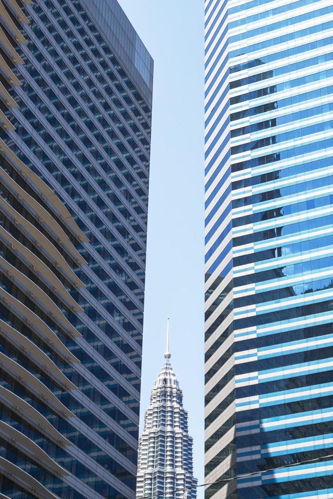 Kuala Lumpur, Malaysia, February 24, 2020. View on skyscraper on a background of blue sky. photo
