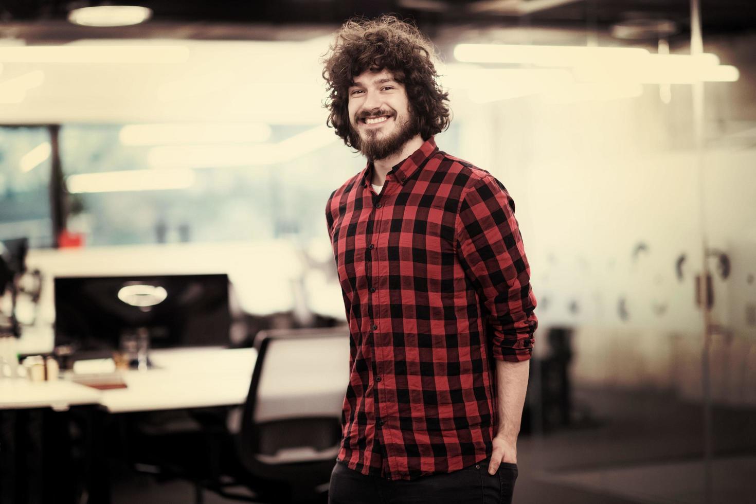 Portrait of smiling male software developer photo