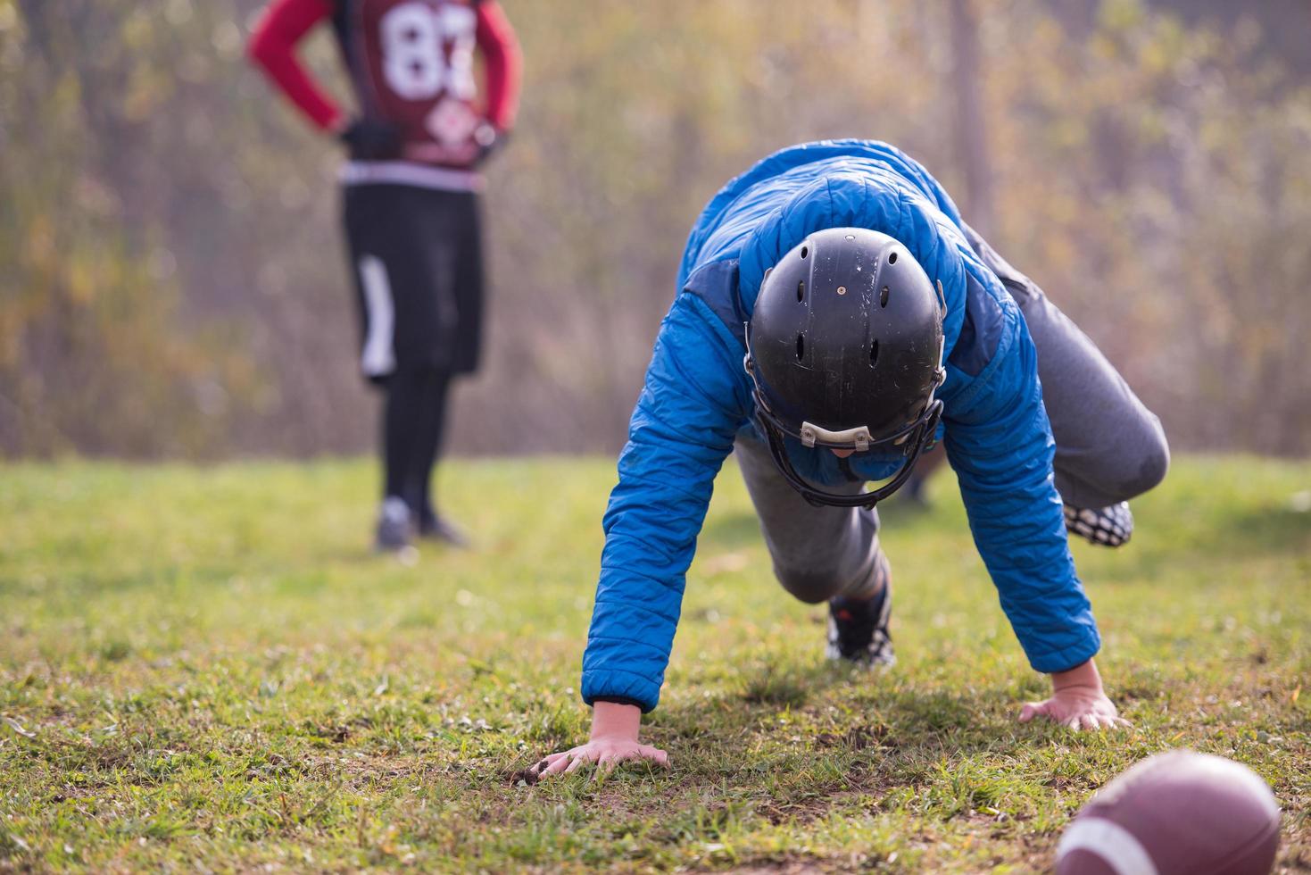 american football player in action photo