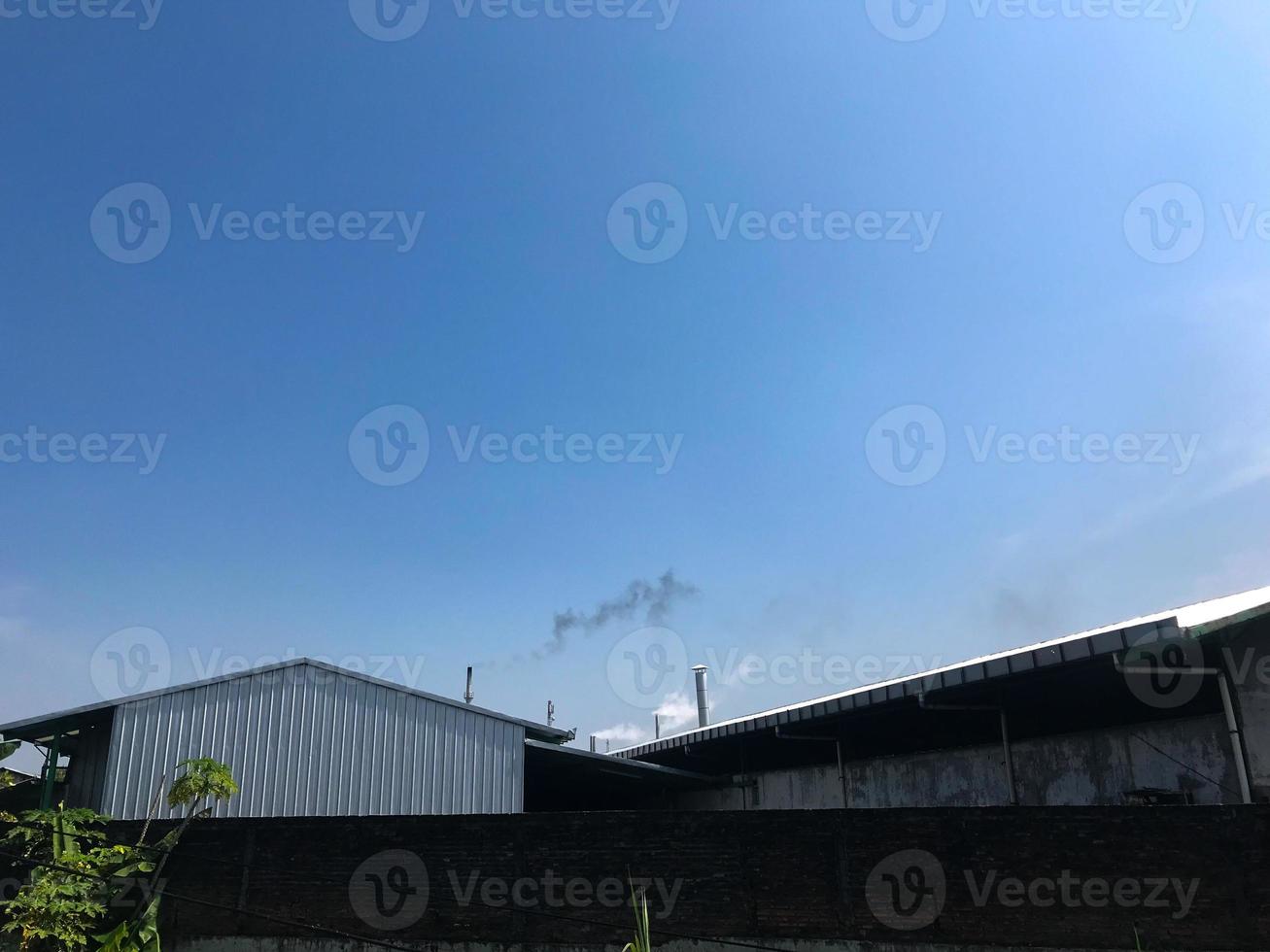 Chimney emitting black gas photo