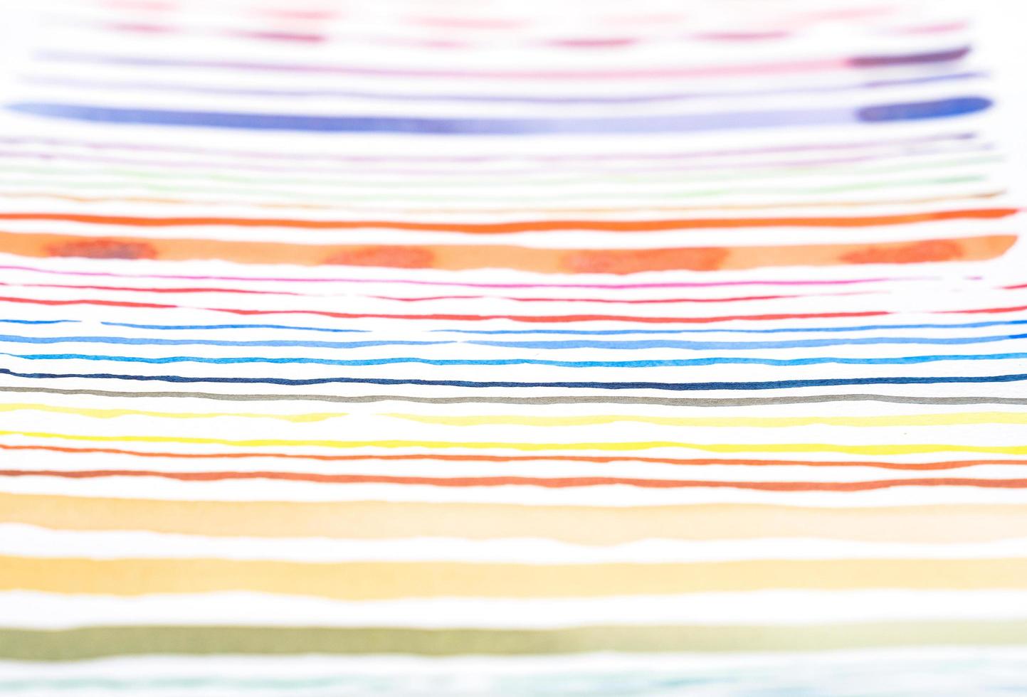 Abstract watercolor lines pattern background. Colorful watercolor painted brush strokes on white. photo