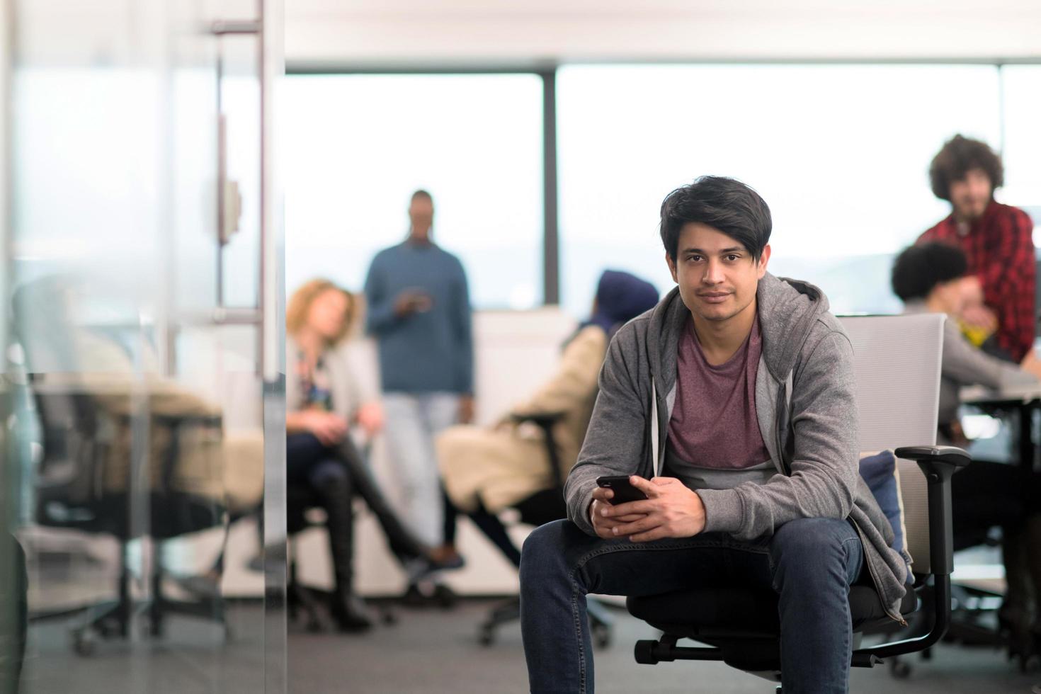software developer using mobile phone photo