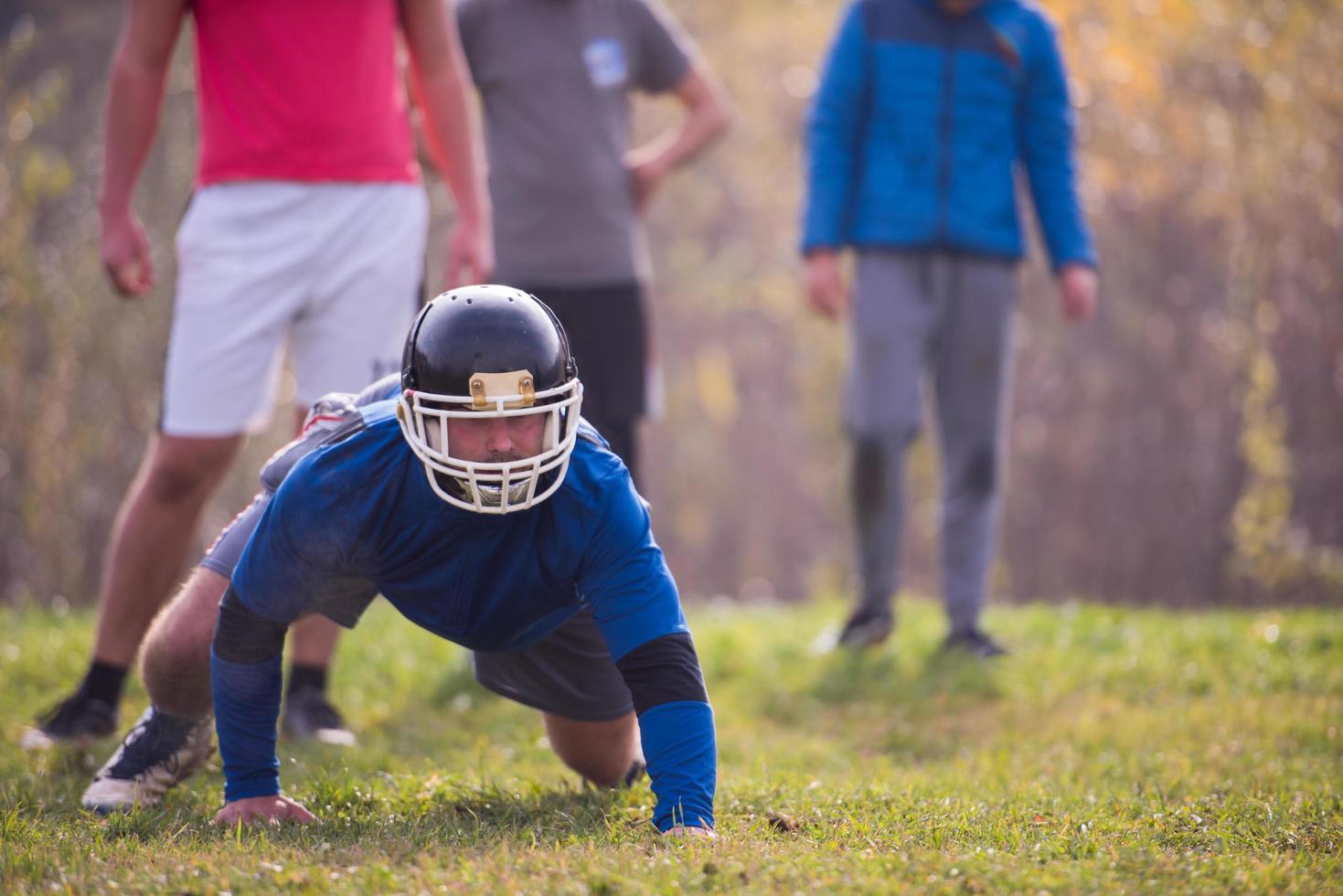 american football player in action photo