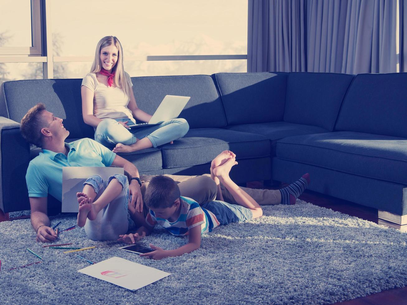 Young Couple Spending Time With Kids At Home 12712069 Stock Photo At young-couple-spending-time-with-kids-at-home-12712069-stock-photo-at