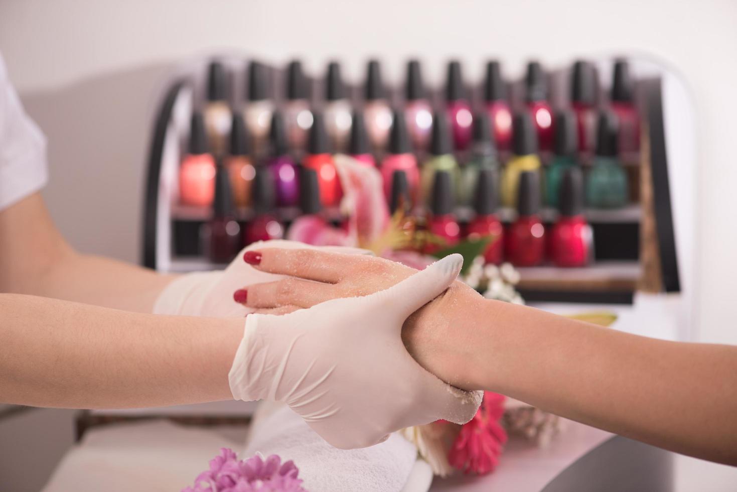 Woman hands receiving a manicure photo