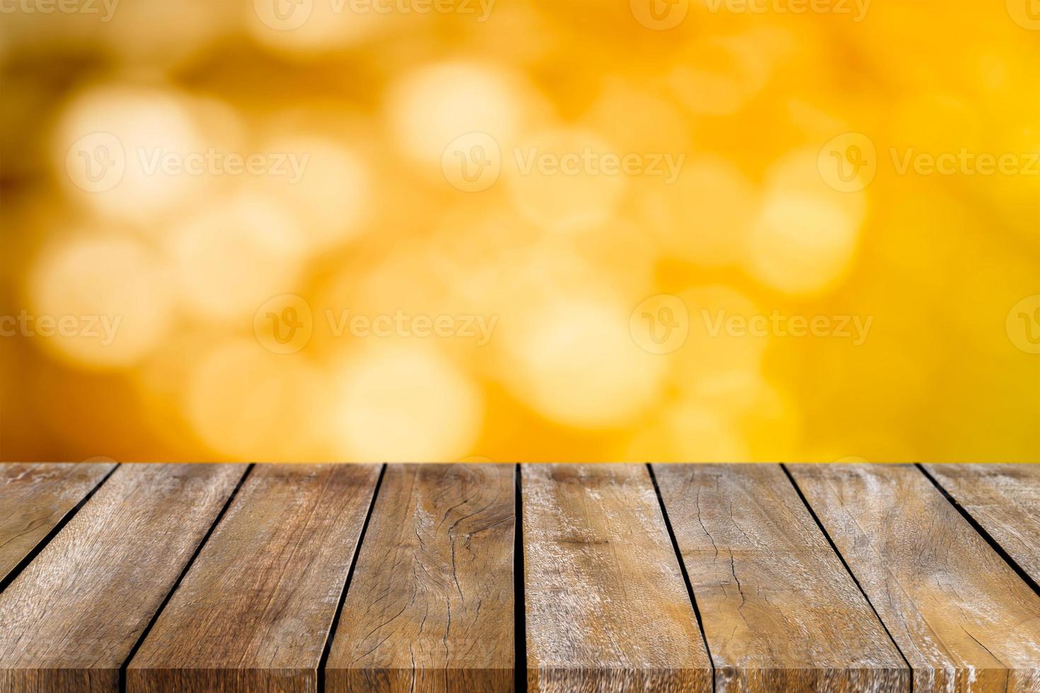 Empty of wooden table top with bokeh background. For montage product display or design key visual layouts. photo