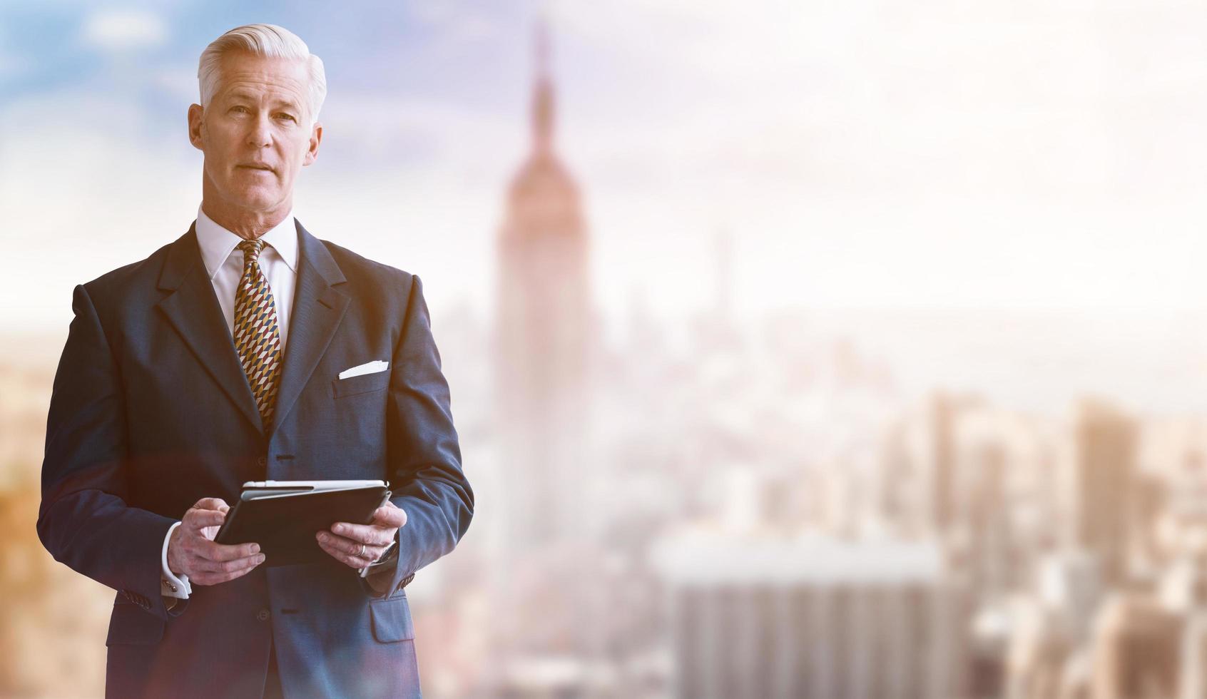 Portrait of smiling senior businessman photo