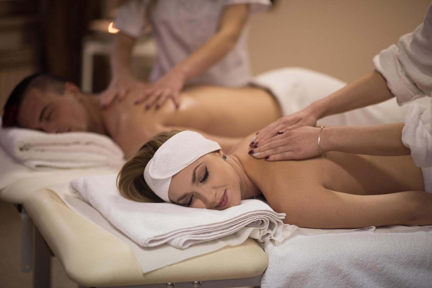 couple receiving a back massage photo