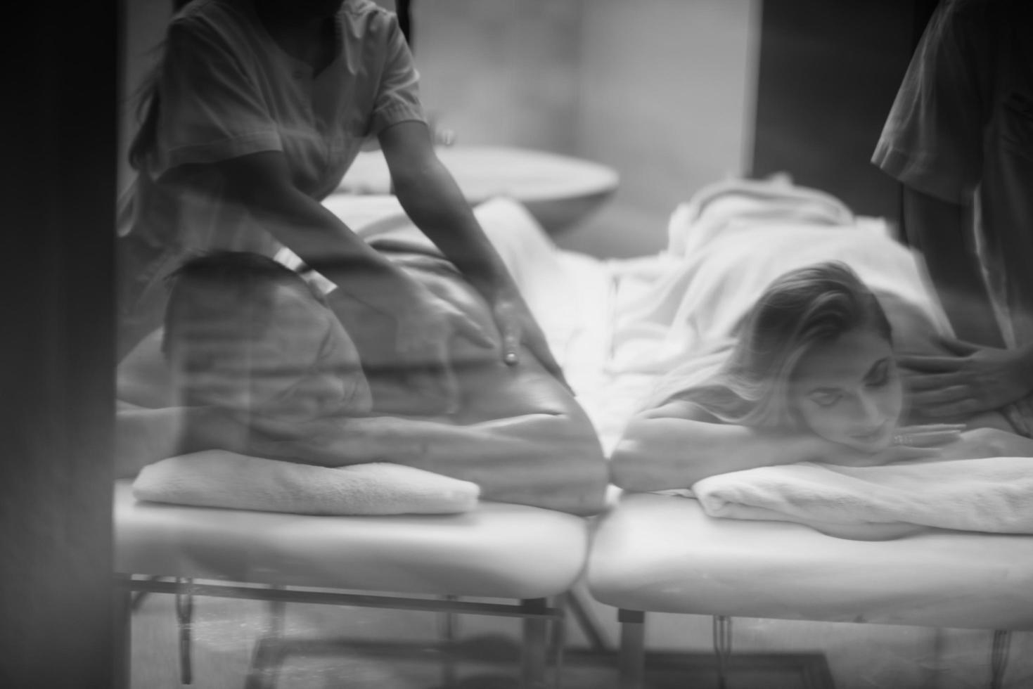 couple receiving a back massage photo