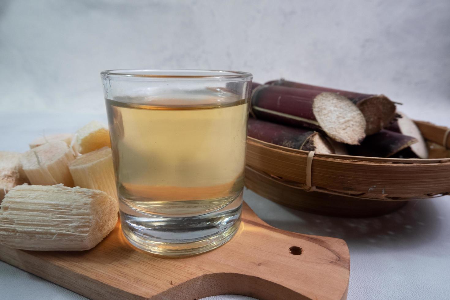 black sugarcane pieces, useful for relieving coughs and sore throats. with the scientific name Saccharum sp photo