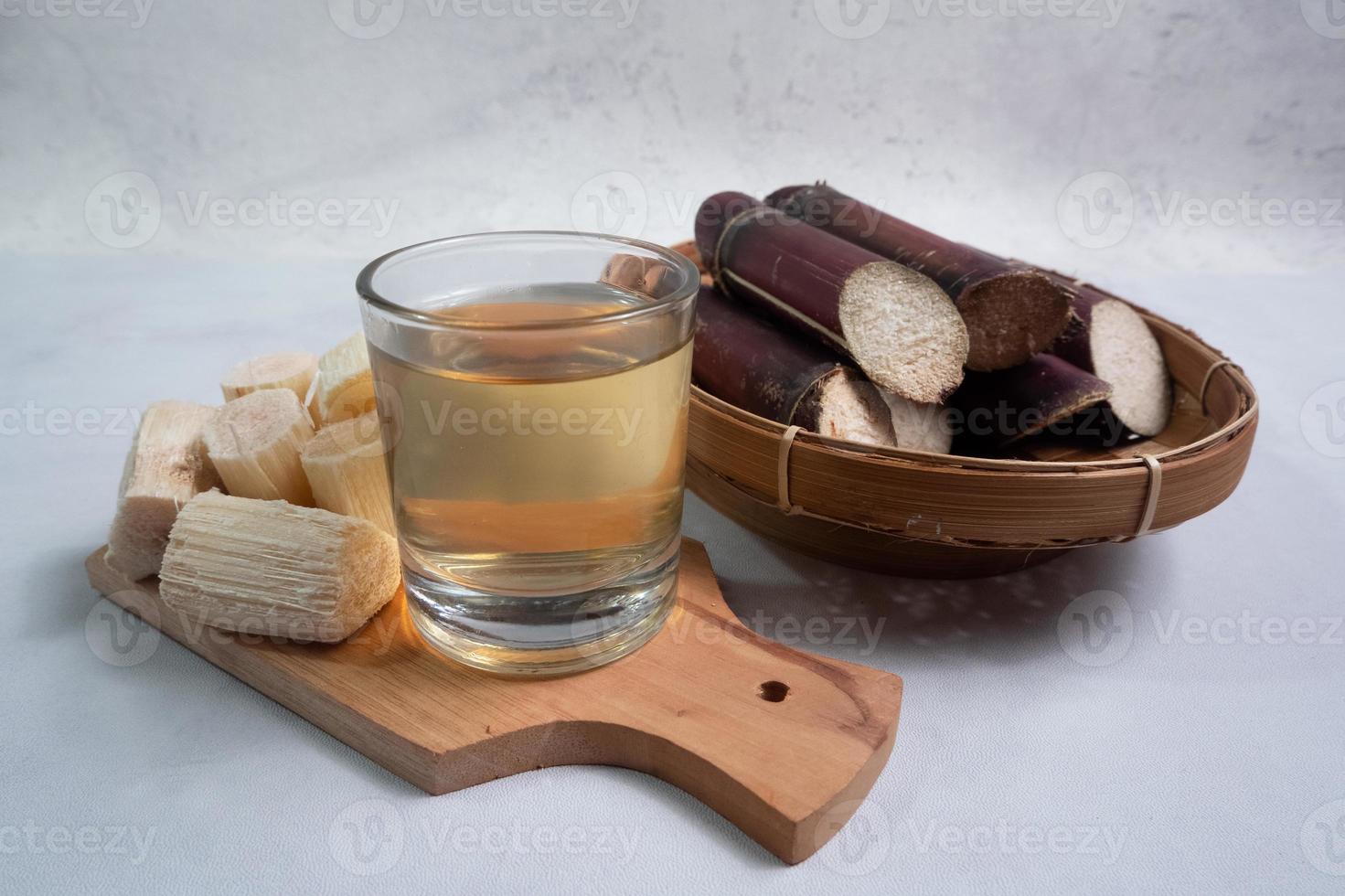 black sugarcane pieces, useful for relieving coughs and sore throats. with the scientific name Saccharum sp photo