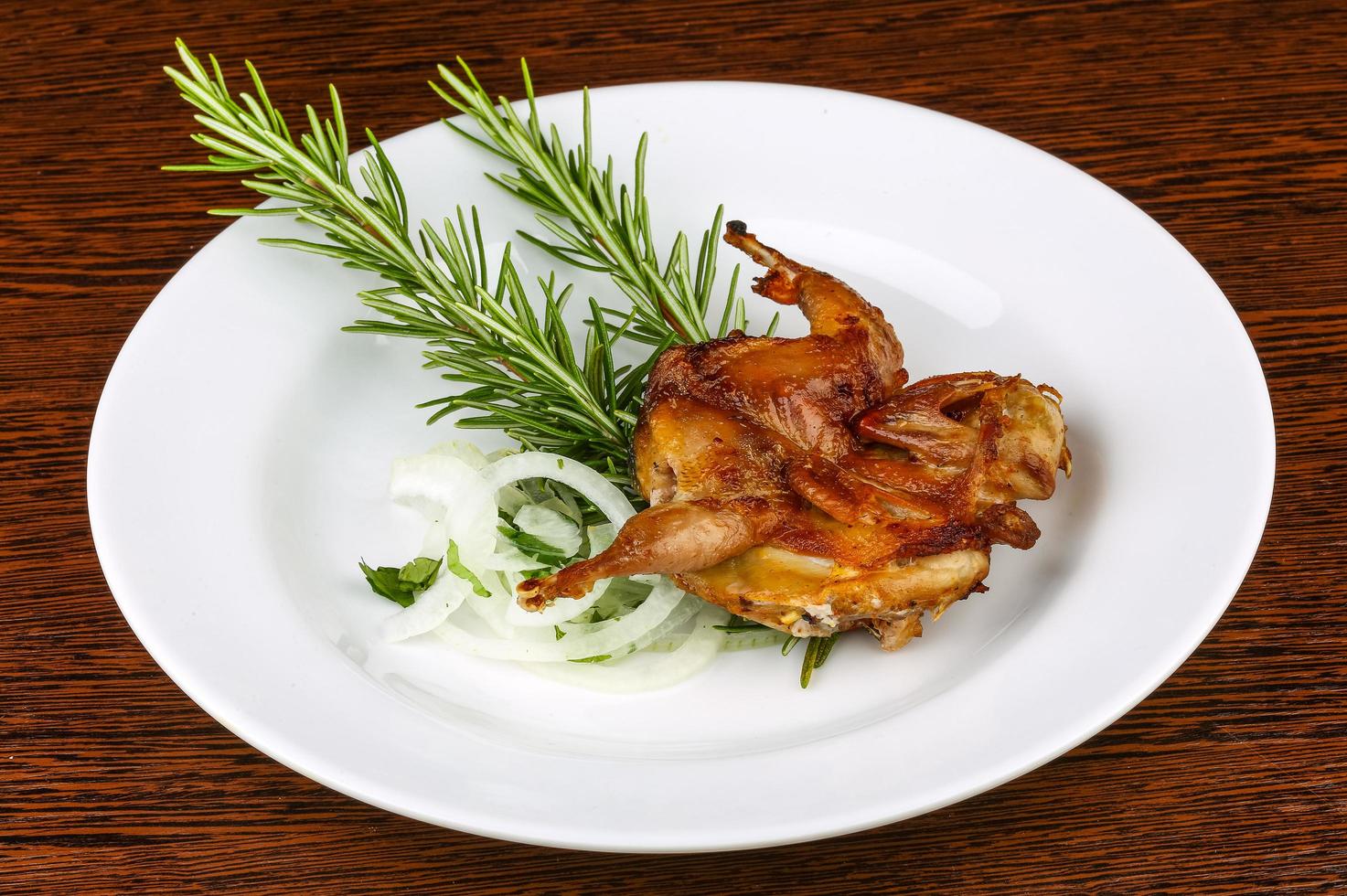 Grilled quail dish photo