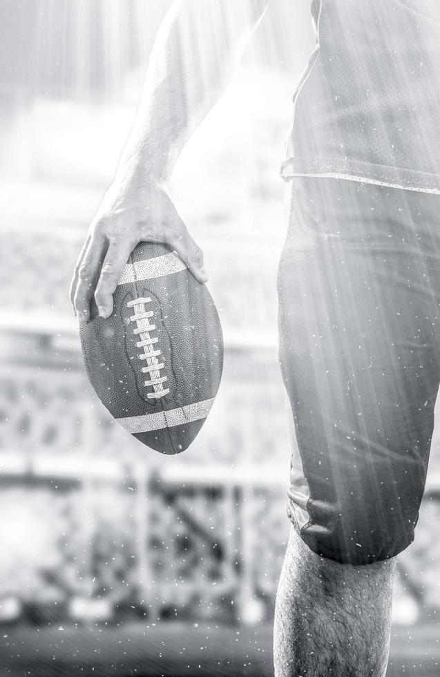 closeup American Football Player isolated on big modern stadium photo