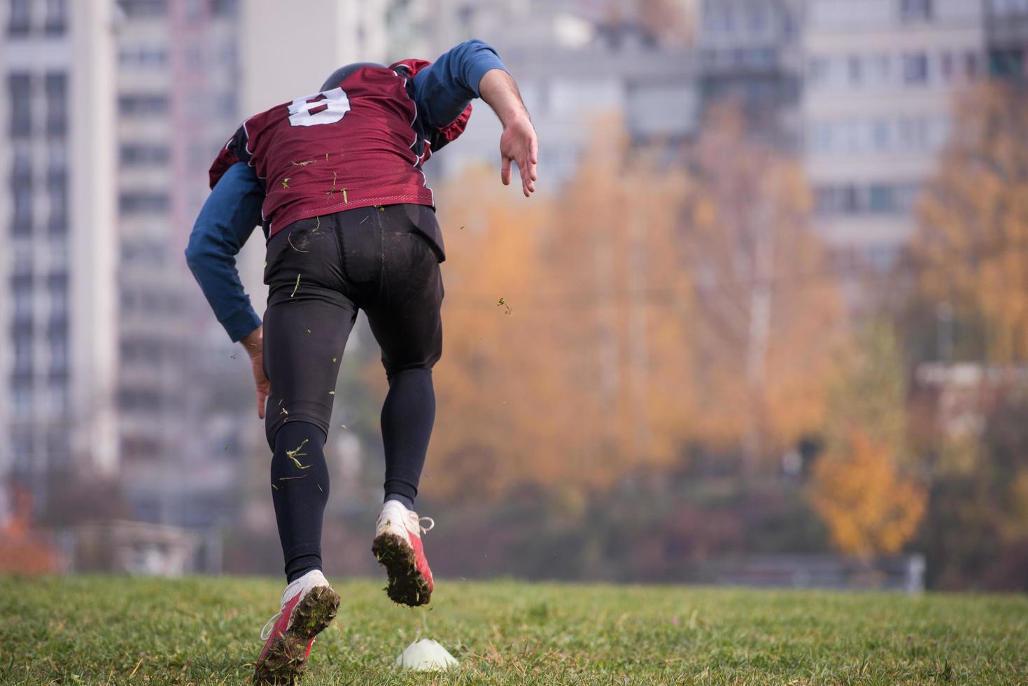 american football player in action photo