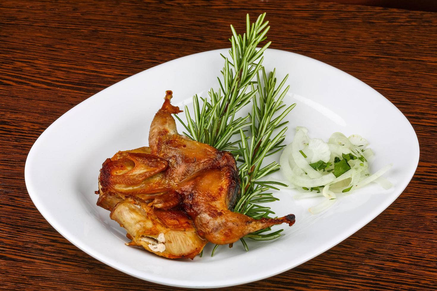 Grilled quail dish photo