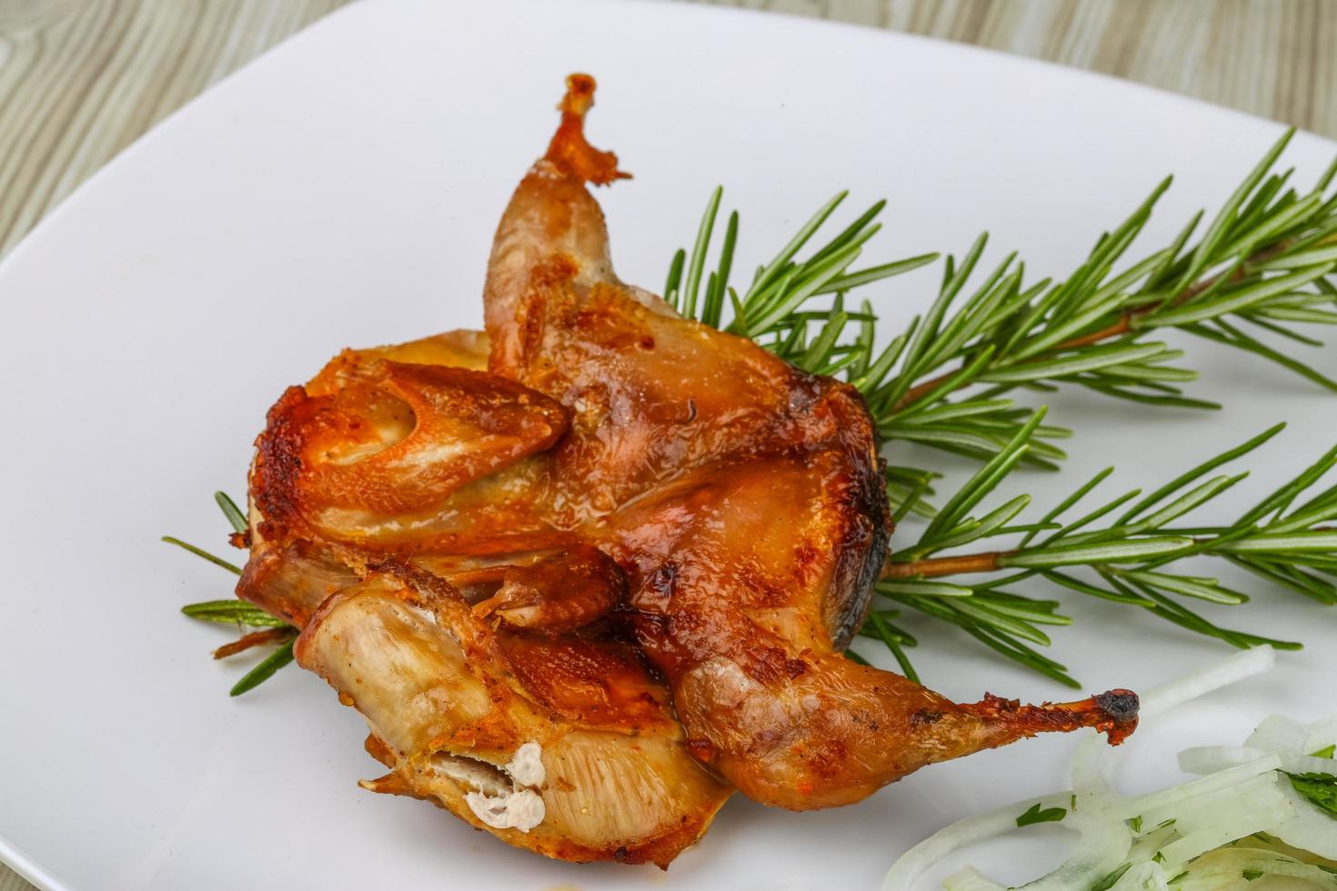 Grilled quail dish photo