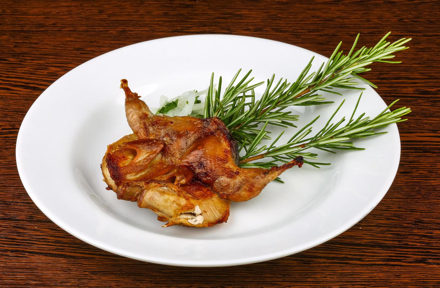 Grilled quail dish photo