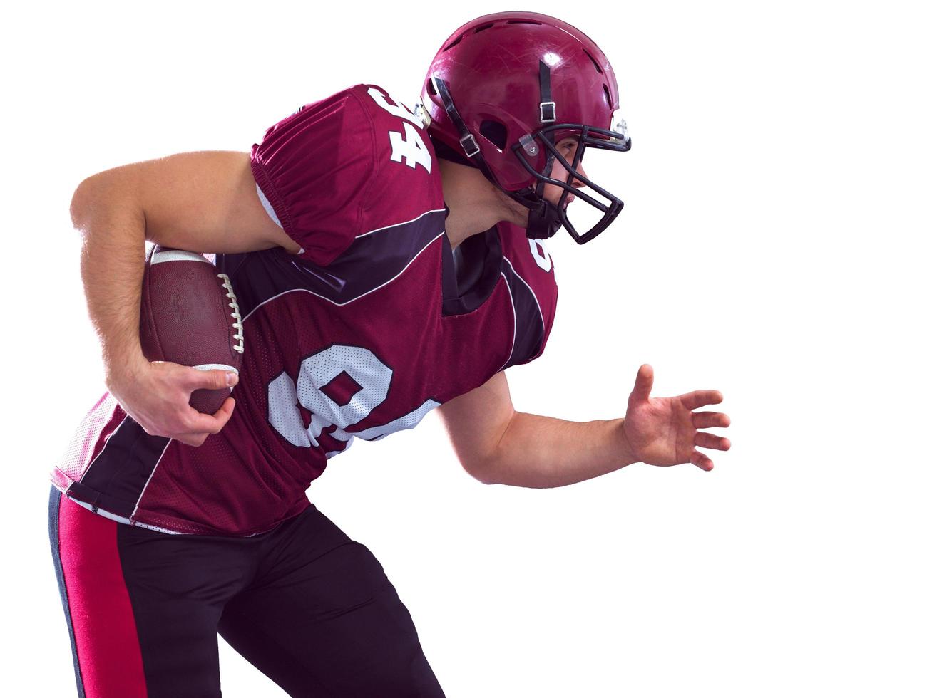 American football Player running with the ball photo