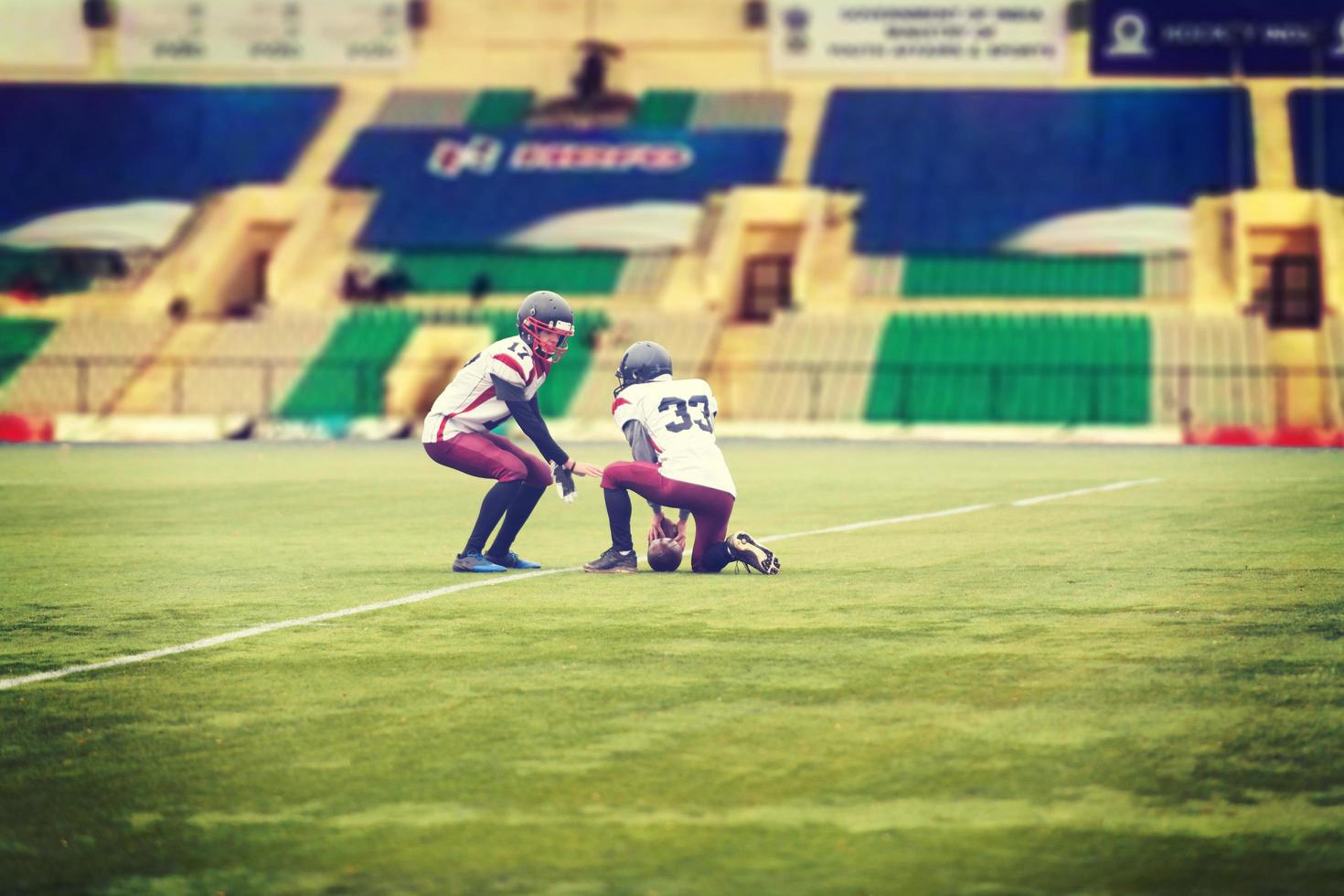 american football players practicing football kickoff photo