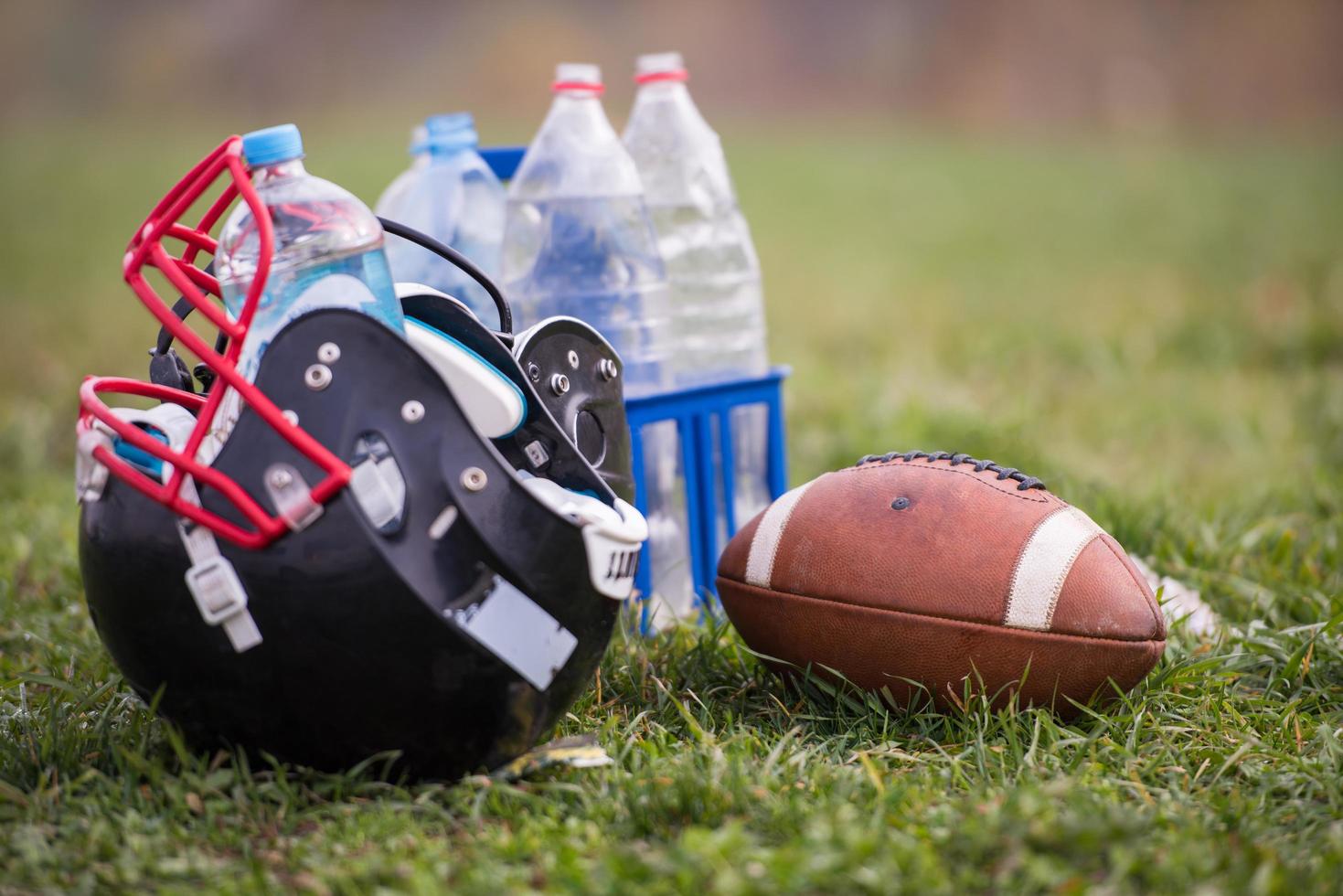 American football helmet and ball photo