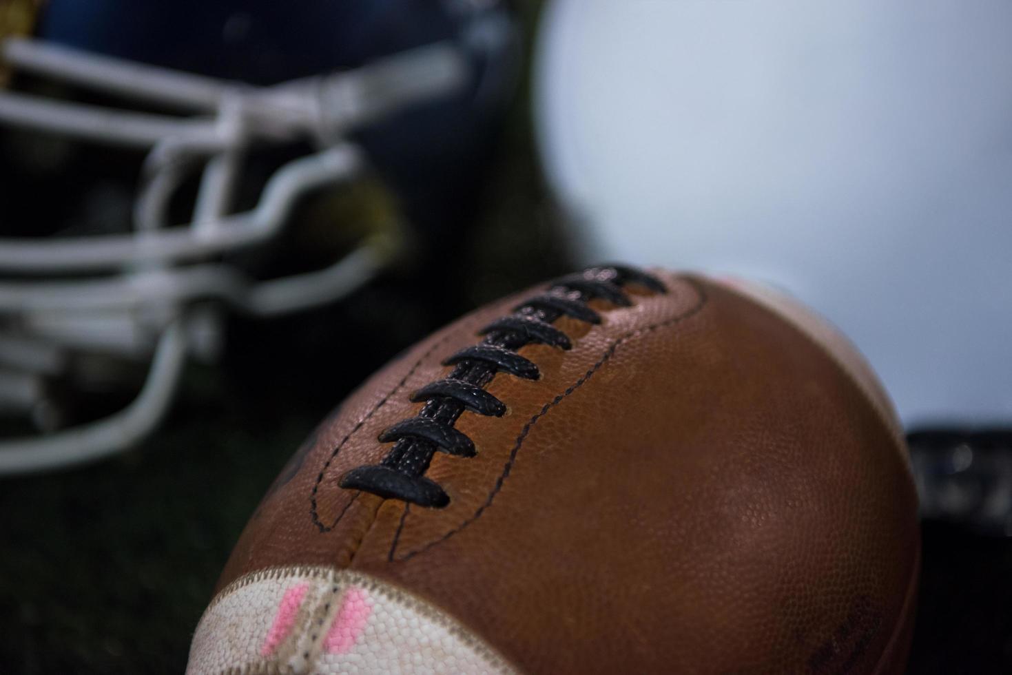 american football and helmets photo