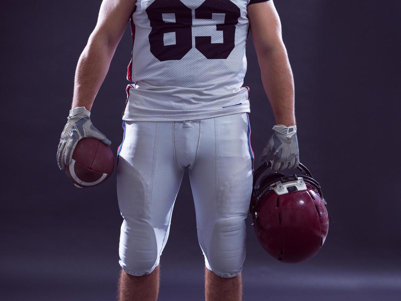 closeup American Football Player isolated on gray photo