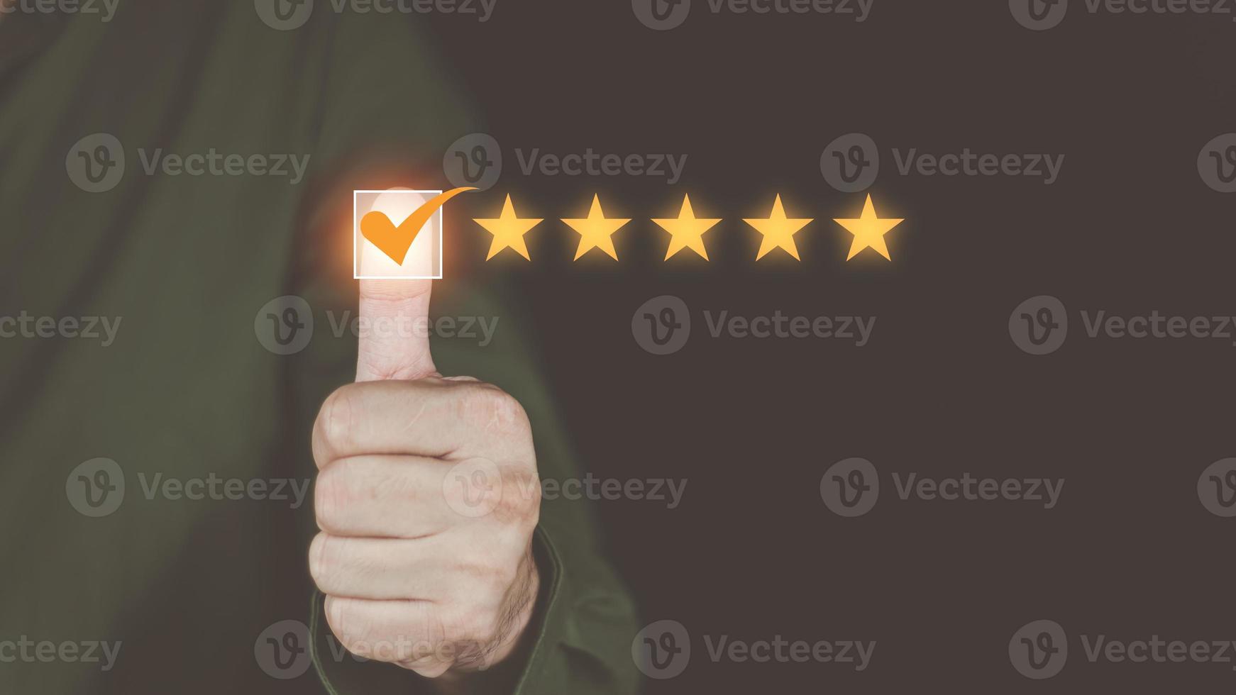 Customer service and Satisfaction concept Men's hands doing online assessments in the satisfaction rating the popular service company allows customers in order to improve and develop the organization photo