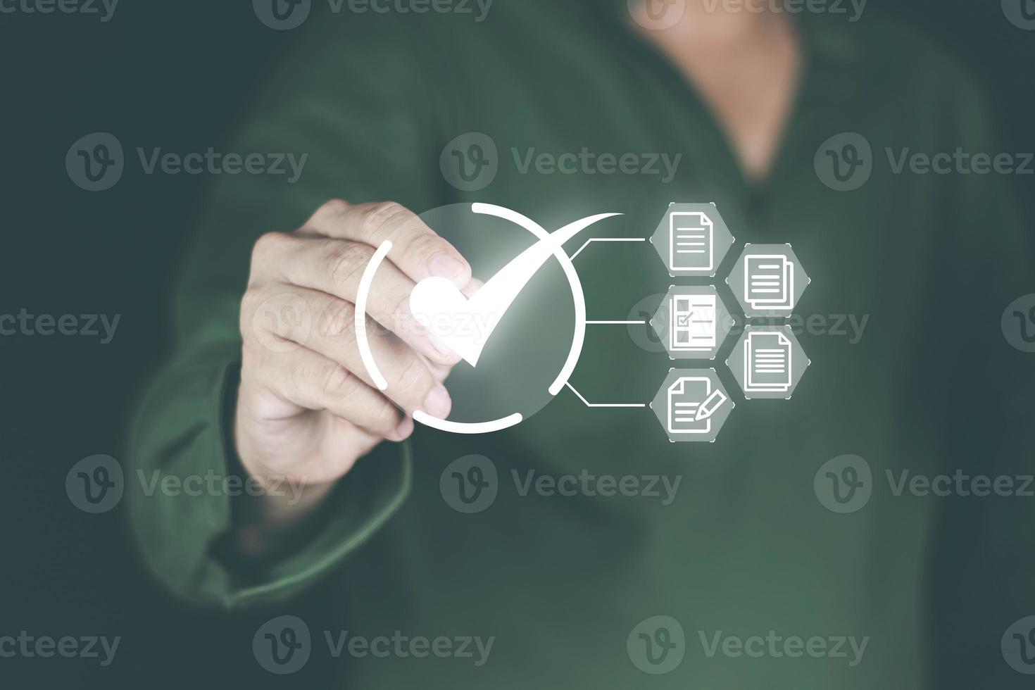 Online document approval concept. Man's hand using a pen. Sign the approval on the touch green screen to be forwarded to the document storage system Through the Internet and forwarding photo