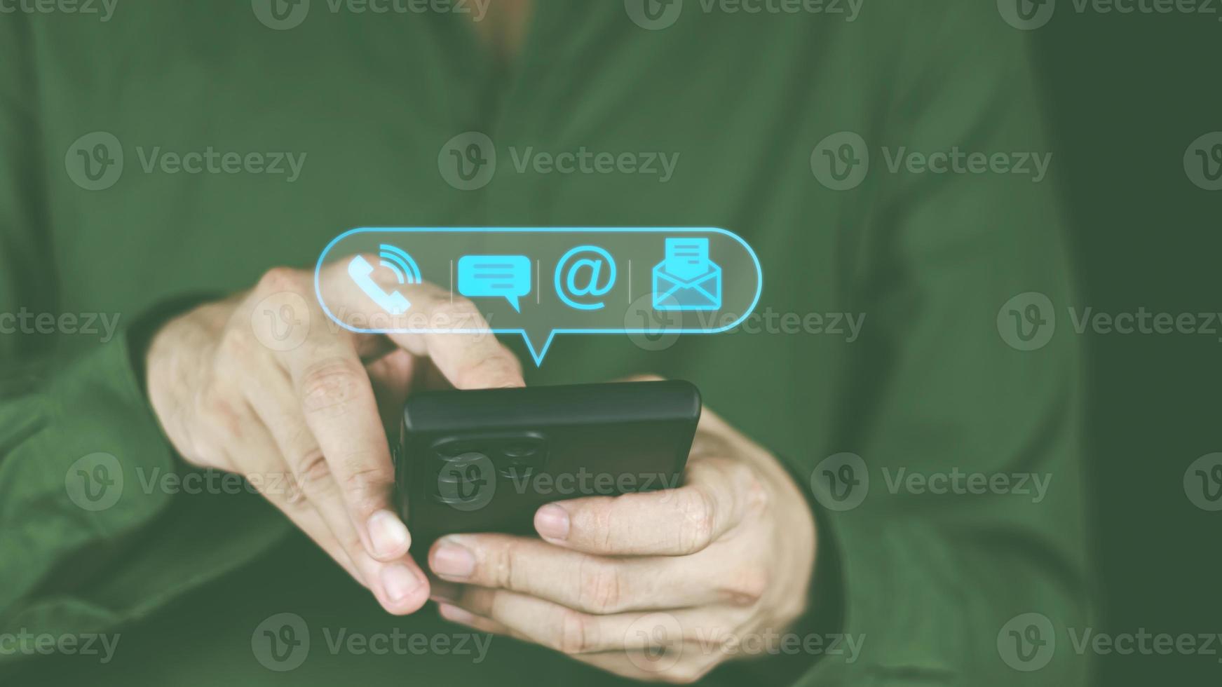 Customer support hotline Contact concept Customer service representative's hands are filling out information from mobile phone to computer. and notify the contact address to the service use photo