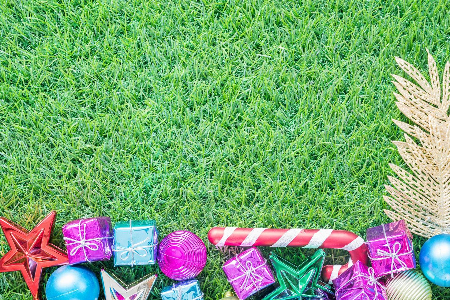 Christmas decoration on green grass with copy space photo