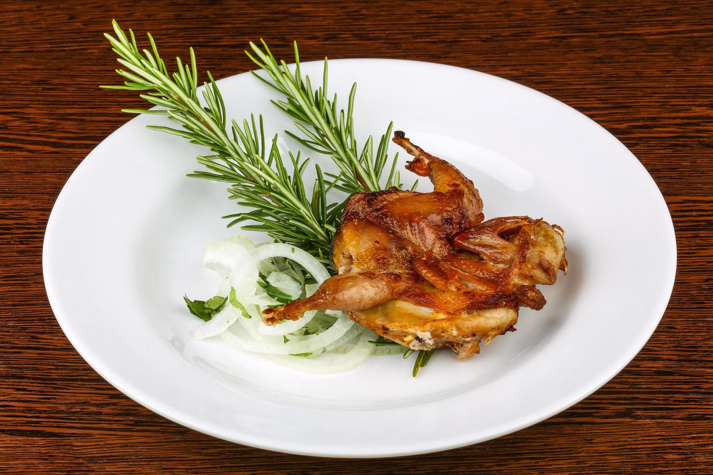 Grilled quail dish photo