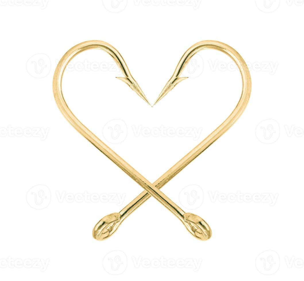Gold fish hook isolated on a white photo