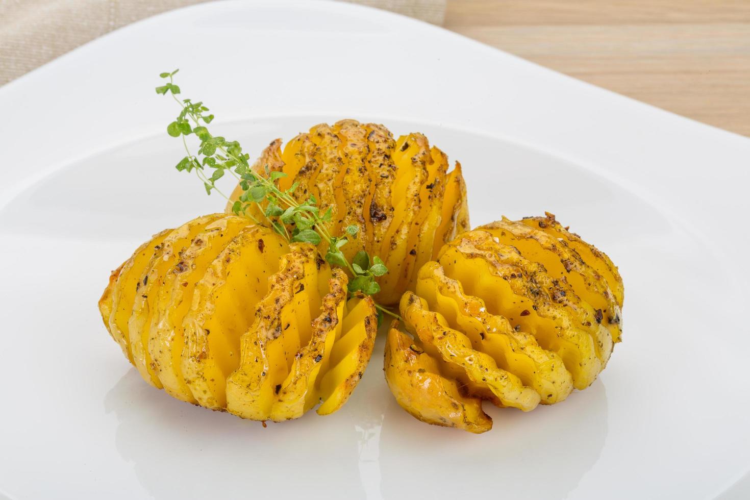 Baked potato on plate photo