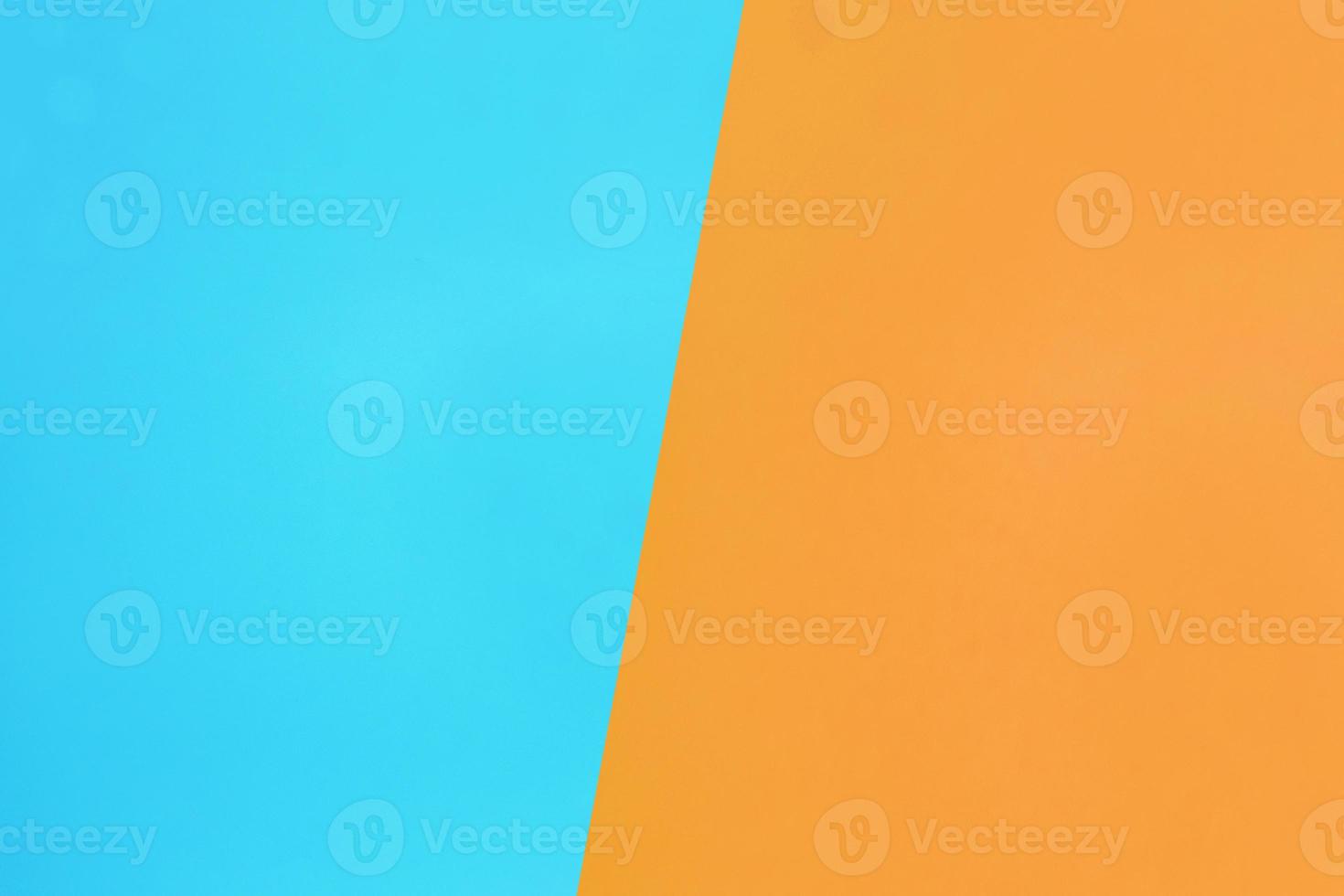 blue and orange pastel color paper texture top view minimal flat lay background photo