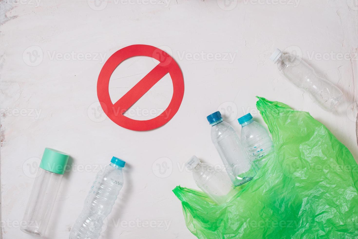 No plastic recycle concept, plastic bottles stack to recycle on white background photo