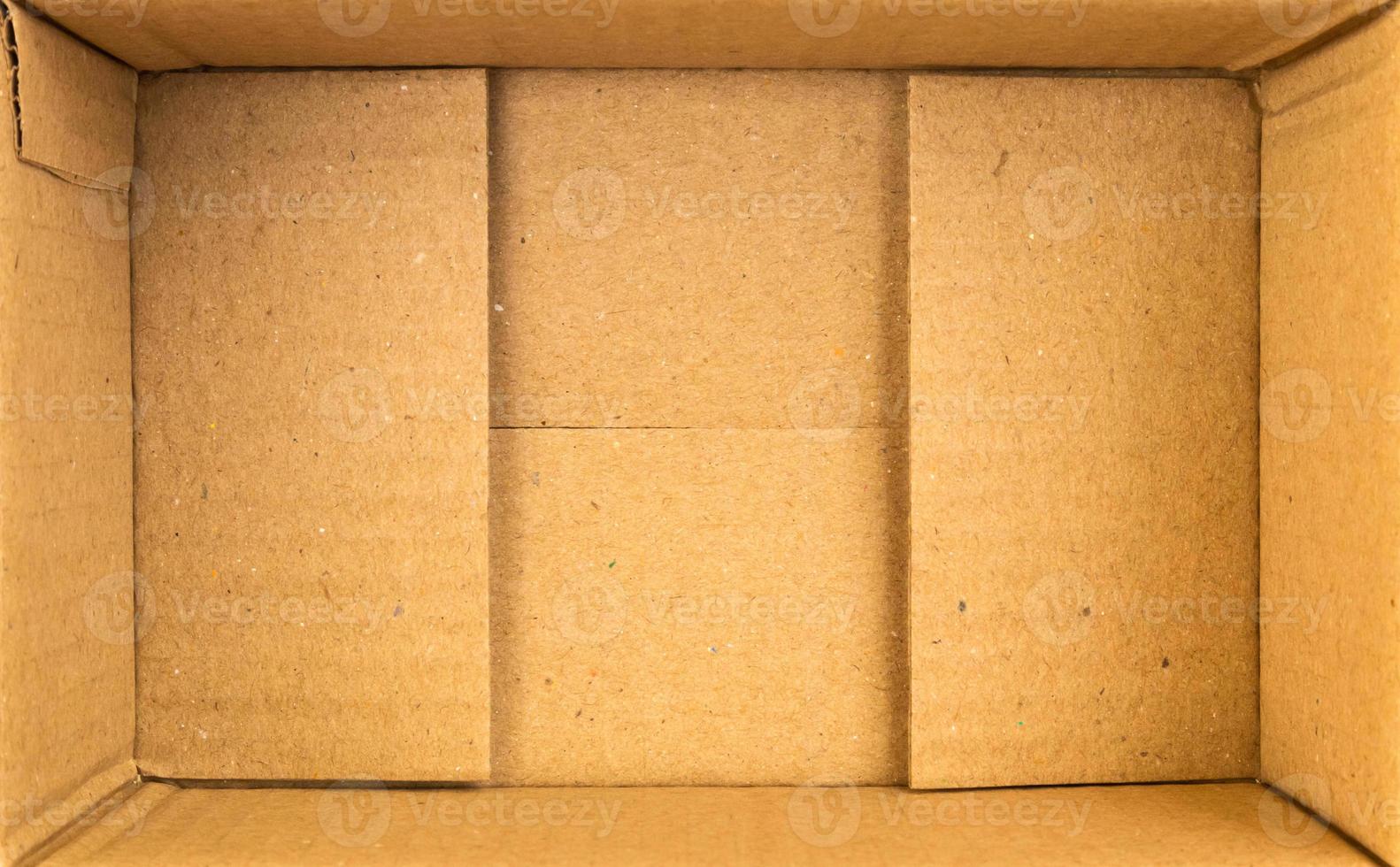 Open empty brown cardboard box background top view photo