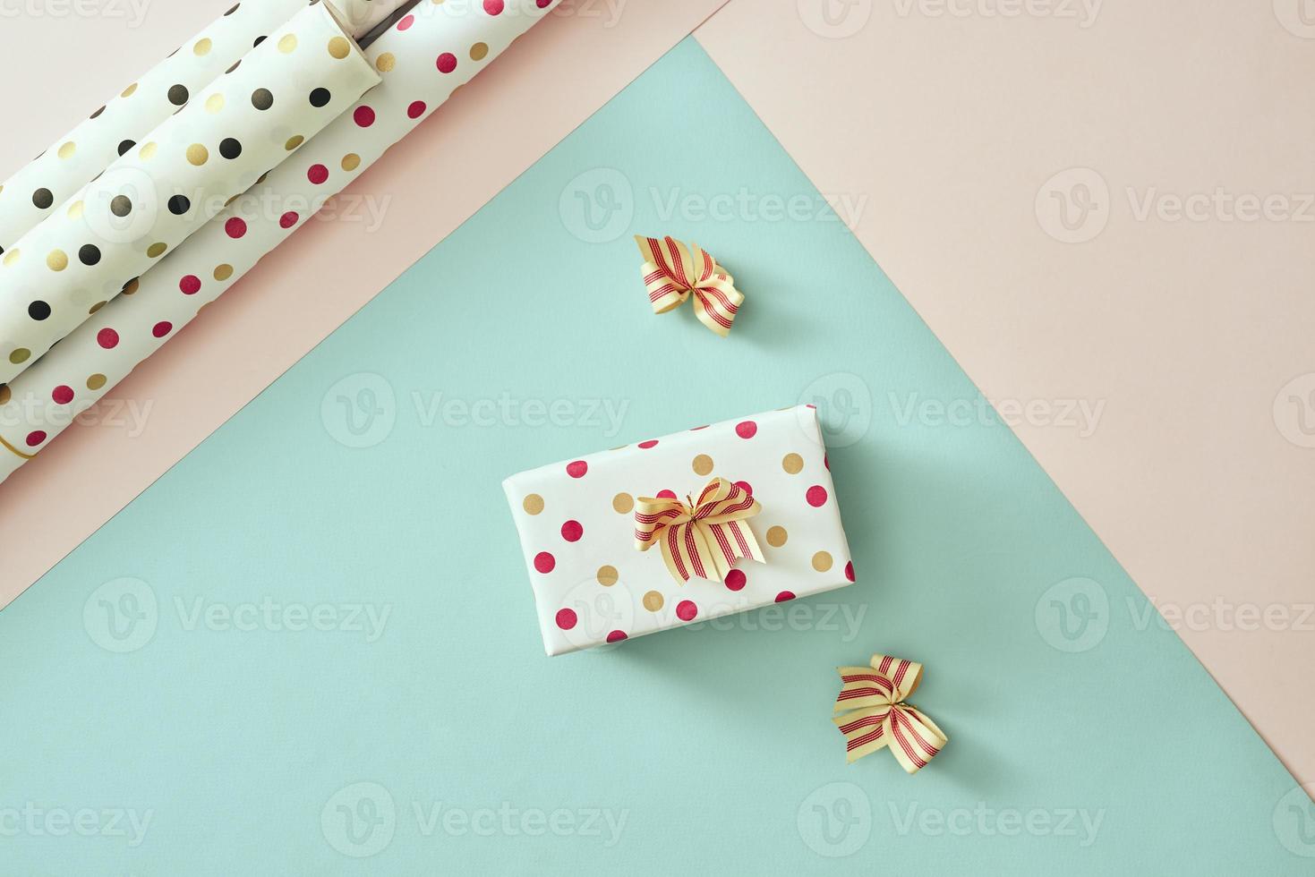 Gift box with ribbon overhead view - flat lay photo