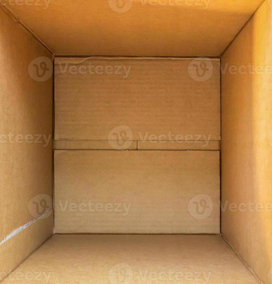 Open empty brown cardboard box background top view photo