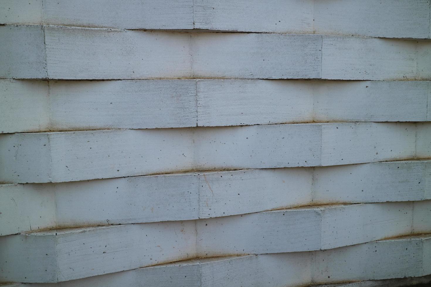 wall of white bricks arranged in a zig zag photo