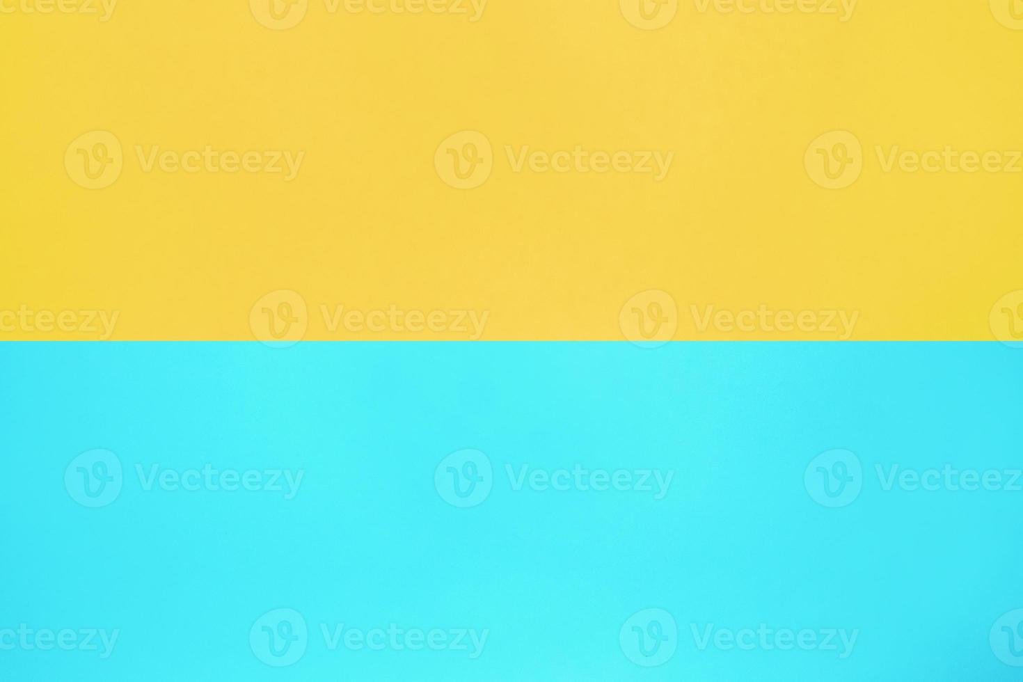 blue and yellow pastel color paper texture top view minimal flat lay background photo