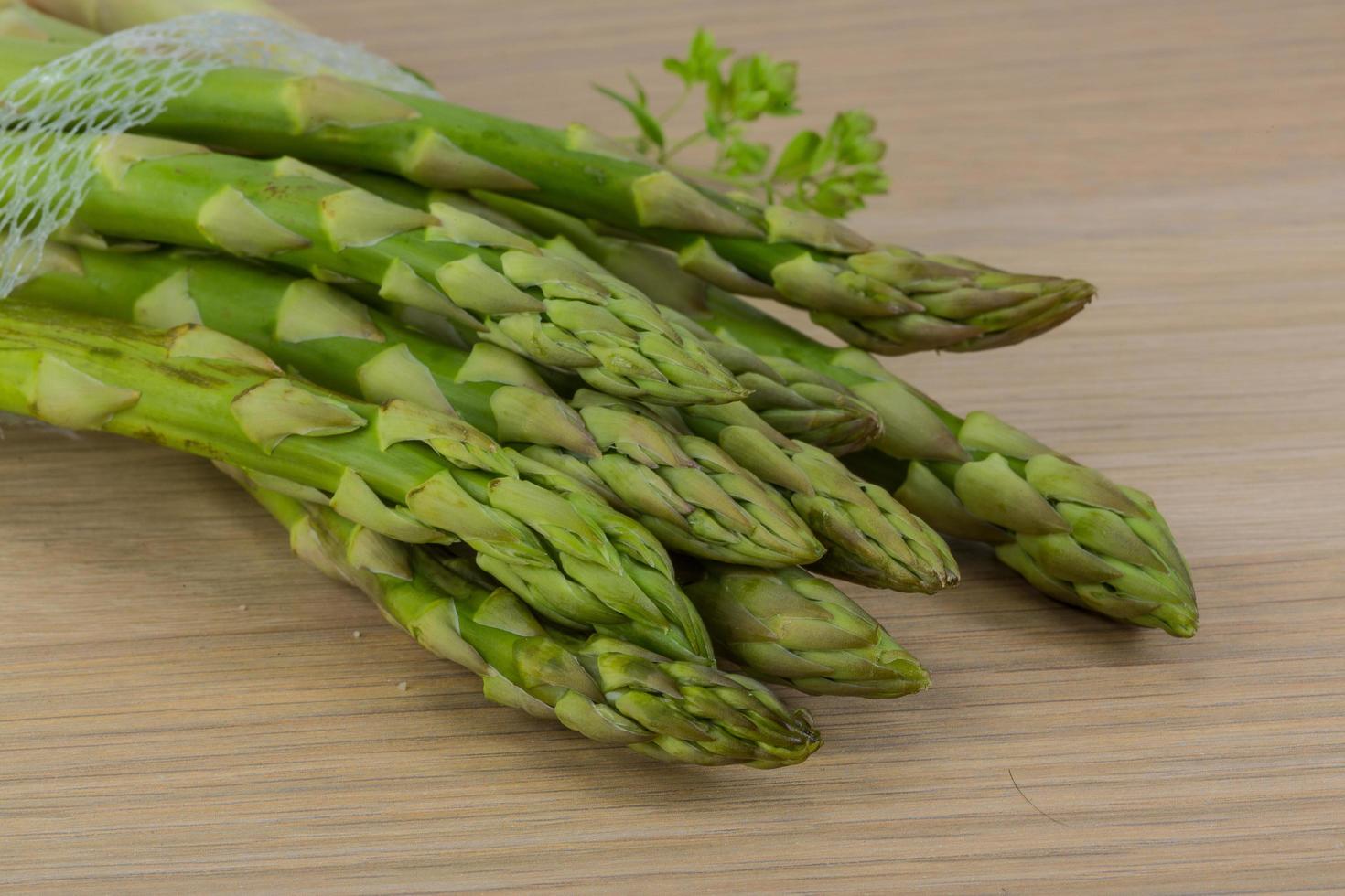 Raw asparagus dish photo