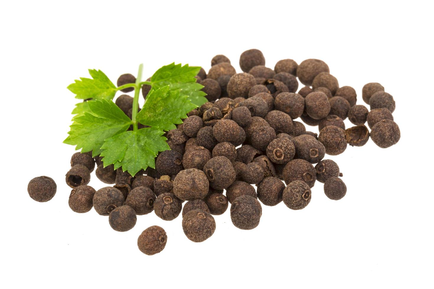 Black pepper on white photo