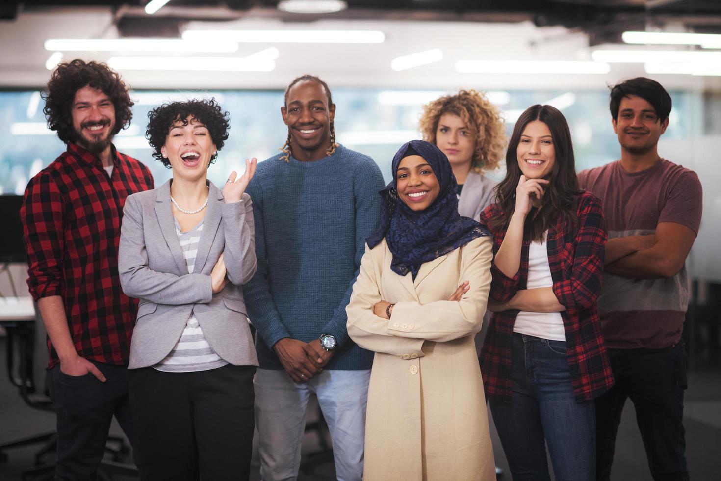 portrait of young excited multiethnics business team photo