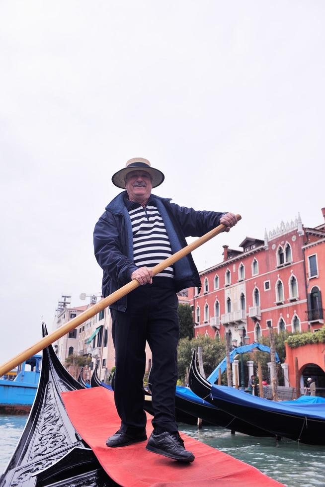 venice italy, gondola driver in grand channel photo