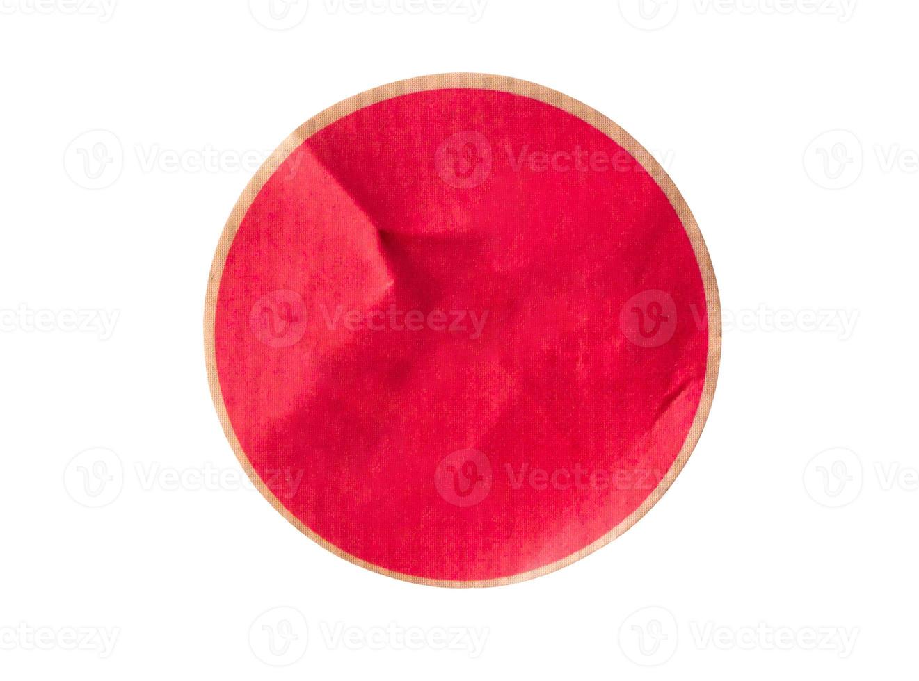 Blank red round adhesive paper sticker label isolated on white background photo