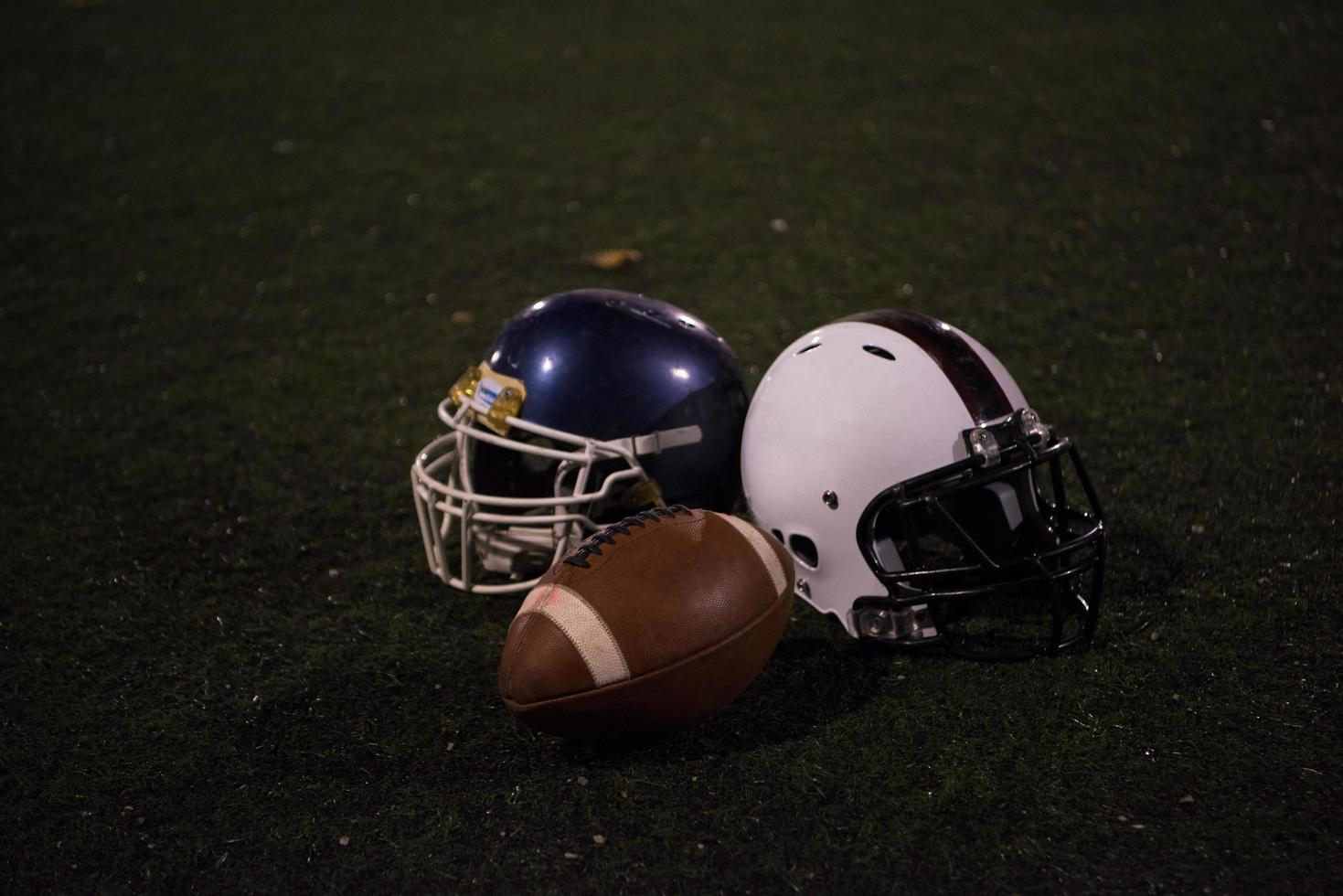 american football and helmets photo