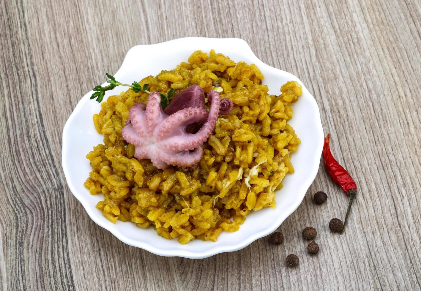 Seafood risotto dish photo